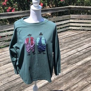 Cute green casual top with 2 figures on front